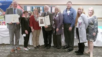 Pictured at the awards dinner (from left) are task force members: Pike County Commissioner Ronald Schmalzle, Kelly Stagen of Hemlock Farms Conservancy, Task Force Chair Rosemarie Schoepp of Kids Play Today, Pike County Commissioner Matthew Osterberg, Dr. Cathleen Mattos of Dingmans Medical Center, Task Force Liaison Brian Snyder of the Pike County Planning Office, Jill Gamboni of Rep. Michael Peifer's Office, and Michele Long of the Pike County Conservation District.