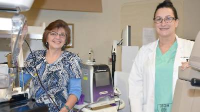 Lisa Medvetz, MD, right and Lisa Ryder, RT (M), Wayne Memorial chief mammography technologist with stereotactic biopsy equipment.