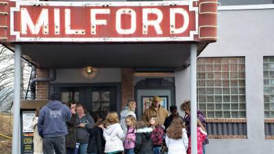 Patrons at the Milford Theater in pre-pandemic times (File photo by Marta Serra-Jovenich)