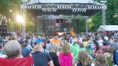 Music lovers listen to performers on a temporary stage set up at Ann Street Park during the 2009 Milford Music Festival (File photo by Nick Troiano)