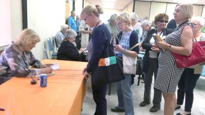 Anne Perry, a popular and prolific writer of historical detective fiction, signs books.