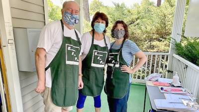 Volunteers (from left): Ed Gragert, Adriana Vilela, and Kim Giarratano (Photo provided by the Ecumenical Food Pantry)