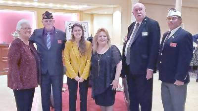 From left: Guyette Calles, District Auxiliary President; Wayne (Popeye) Perry, State Commander; Autumn Baker; Sandra Wilder, State Auxiliary President; William (Doc) Schmitz, National Commander; Rick Ellis, District Commander