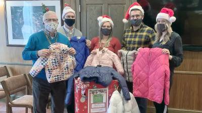 From left: Pike County Commissioner Matthew Osterberg; Michael Lamoreaux, P.E., Principal, McGoey Hauser &amp; Edsall; Stephanie Everson, Case Manager, Family Promise; Robert Ruiz, Director of Human Services; and Kayla Orben, Human Services Coordinator (Photo provided)