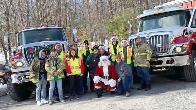 Santa on his visit to Delaware Township last year. This year, the Firefighting Elves are keeping the traditional going with a twist (Delaware Township Volunteer Fire Company Facebook page)