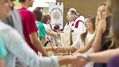 During flu season, parishioners will do the Sign of Peace (as pictured) without physical contact in the Diocese of Scranton, according to a directive by Bishop Bambera.