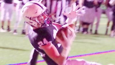 Delaware Valley tight end Cooper Kidd catches the ball to score a touchdown in the first half.