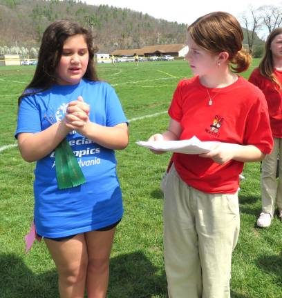 Abbie Blazeski interviews athlete Leah Luttke.