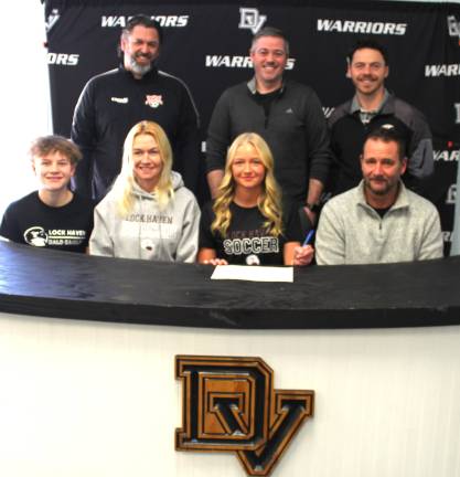 <b>P</b>ictured (left to right: front row) – Leif-Erik (brother), Mrs. Veronika Orby, senior Krystina Orby and Mr. Frank Orby. (back row) – Eastern Pike soccer coach Derek Eversdyke, assistant coach Jeff Luhrs and head coach Kevin Quinn.