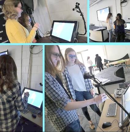 Members of the anatomy class at Delaware Valley High School using high-tech computers