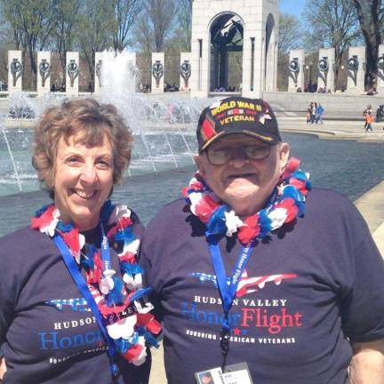 Gene Schneider with Diane Guendel, his traveling companion, at the World War II Memorial. (Photo provided)