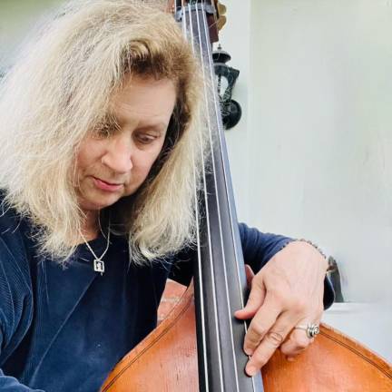 Linda E. Brown on double bass.