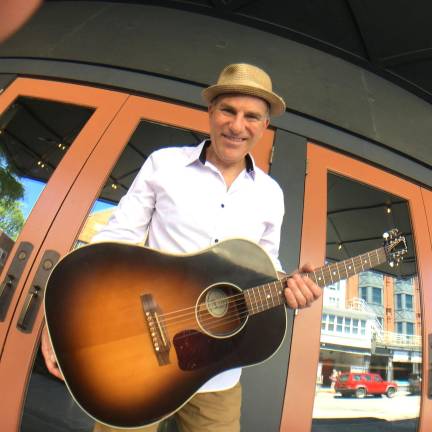 Marc Von Em brings his impressive array of music from blues, folk, funk, and rock- in a solo set at Back Road Brewing on June 28.
