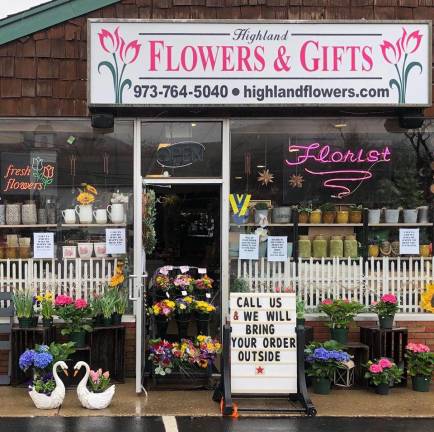 Highland Flowers and Gifts has moved to curbside and delivery only, with owner Lori Struck arranging all orders solo, regardless of how busy it gets.