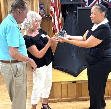 L to R: Don Simon, Nancy Simon and Commissioner Christa Caceres.