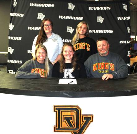 Brielle Spears signs her commitment to play field hockey at King’s College. Front row (L-R): Ashley Turs, Brielle Spears, and Scott Spears. Back row (L-R): Coach Hailey Vogel and sister Taylor Spears.