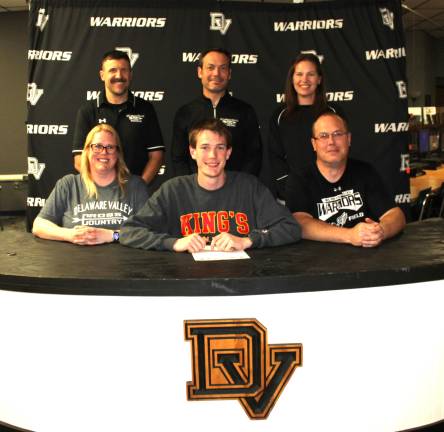John Llewellyn commits to cross country and track and field at King’s College. Front row (L-R): Sabrina Llewellyn, John Llewellyn, and John Llewellyn. Back row (L-R): Head coach Keith Fitzpatrick, assistant coach Justin Roselli, and track coach Audrey Dennis.