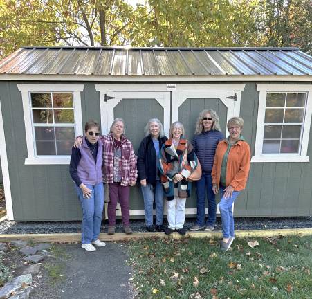 From left, Valerie Brairton, Maria Longono, Vikki Callahan, Judyth Casey, Mary Sorrell and Pat Hendershot near the new Remembrance Place shed.