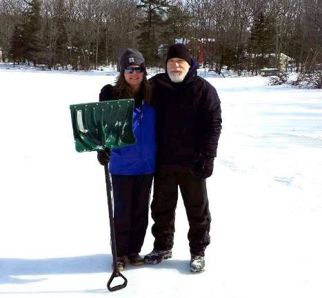 Kerry Robbins of Milford, Pa. "It is hard work clearing the snow from the lake for skating!"