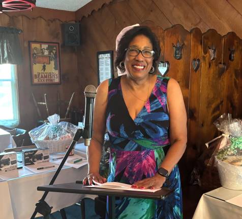 Dr. Cheryl Glenn, chair of the Delaware Dingman Township Democratic Club, addresses attendees at the Margaret Mary Jonas Memorial Scholarship Dinner.