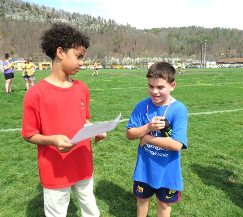 Reporter Isaiah Dillon interviews athlete, Francis Medico.