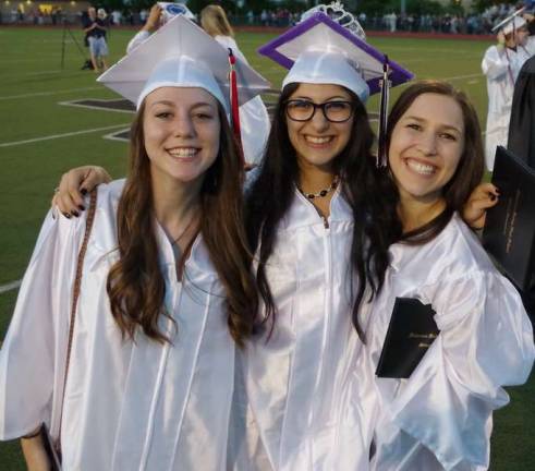 Graduates Heather Gamboni, Angie Serrano and Shannon Ferguson.