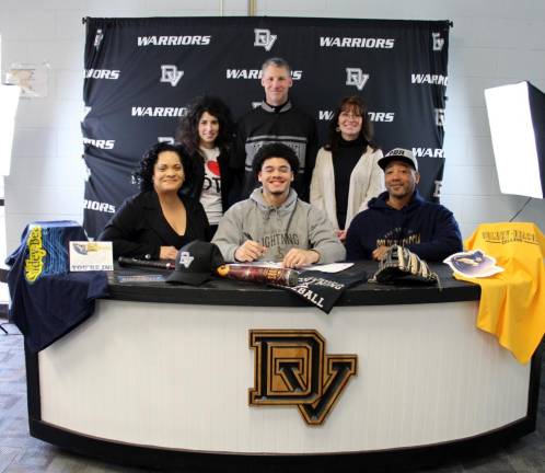 Delaware Valley senior Tyee Irving seated with his parents, Christopher and Irving and (standing l-r) principal Dr. Nicole Cosentino, head baseball coach Sean Giblin and guidance counselor Molly Blaut.