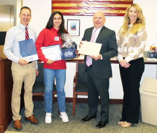 Wayne Highlands Middle School award winner Claire Goldstein (second from left) with teacher Don Burchell (left), The Dime Bank President &amp; CEO Pete Bochnovich, and teacher Erika Cavanaugh.