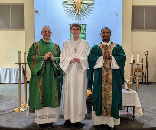 Left to right Fr. Benesch, Deacon John, and Gabriel Wagner Alter server. (Photo from Files of St. Vincent de Paul)