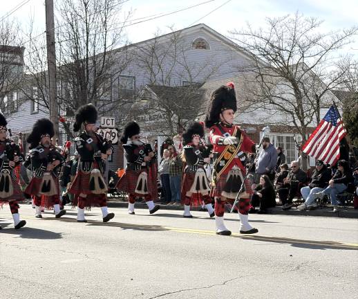 Black Diamond Pipe Band entertains parade watchers.