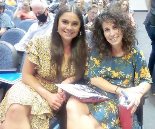 Dr. Nadege Hoeper (left), a doctor of holistic medicine with an office in Shohola, with Dr. Nicole Cosentino, principal of Delaware Valley High School. Dr. Hoeper was once Dr. Cosentino's student, and they are now friends. (Photo by Frances Ruth Harris)