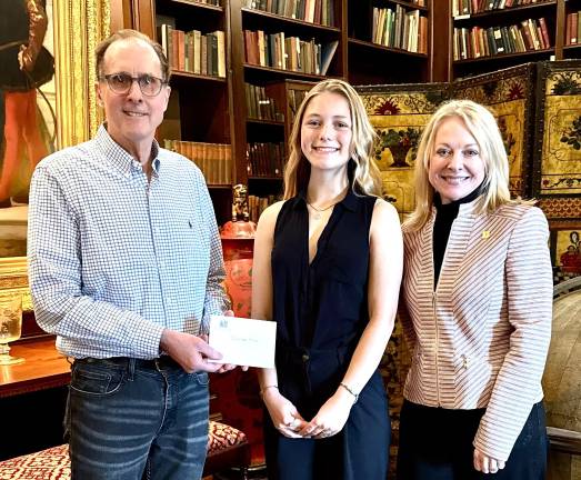 Charlotte Kish from Stroudsburg High School (center) receives the Pinchot Legacy Scholarship.