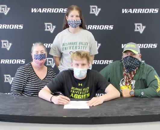 Wrestler Cooper Kidd signs with Delaware Valley University