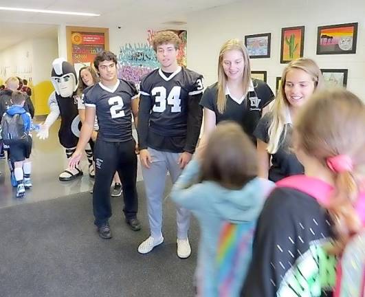 From left: The Warrior, Tarna Batelman, Joshua Balcarcel, Hunter Klein, Melissa Shafer, and Tara Stevenson