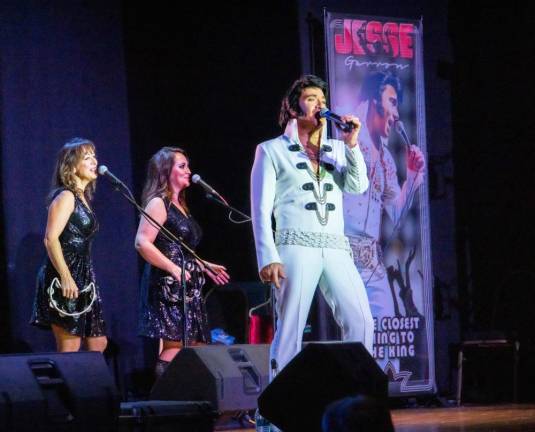 Jesse Garron, Elvis Tribute Artist Jesse Garron and his two back-up singers Julie Malewski (l) and Jessica Nicols.