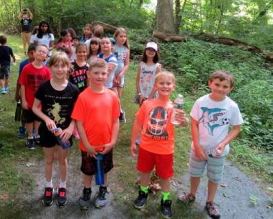 The campers went on nature hikes.