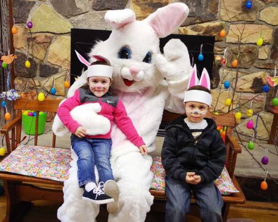 The Easter Bunny with siblings Juliana Lupo, 3, and Christopher Lupo, 5, of Milford