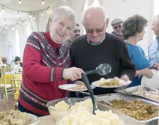 Last year's community dinner at the Church of the Good Shepherd