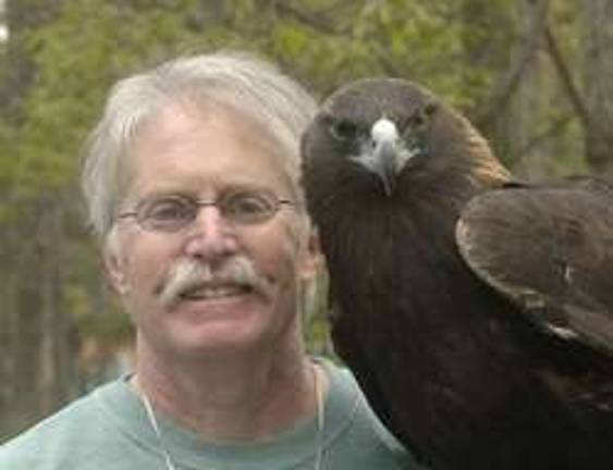 Bill Streeter of the Delaware Valley Raptor Center in Milford shows one of his feathery friends.