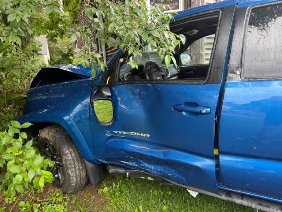The Tacoma driven by Mark Strouse shows damage after the crash.