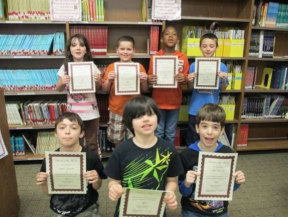 Third graders pictured: (back) Zoe Conant, Corey Muren, Chad Fallen and Joseph Calabria. (front) Jaiden Gostischa, Vincenzo Tuzzolo and Alex Bennett. (absent from photo) Christopher Borges and Christian Adams.