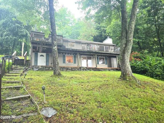 Enjoy water views from this well-maintained affordable lakefront