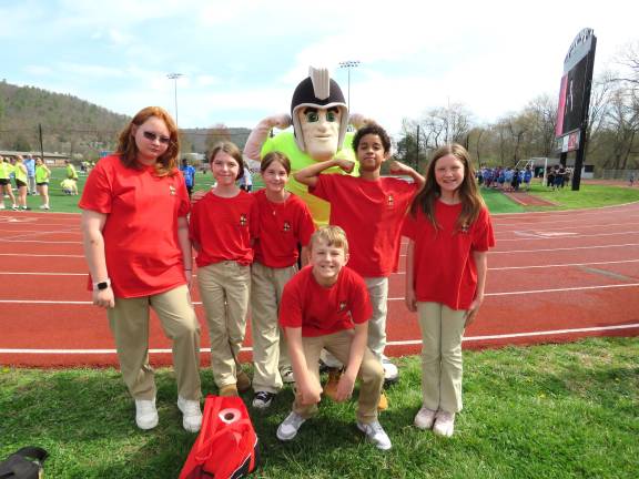 DVE-News/TV reporters took a moment to take a photo with Delaware Valley’s mascot, the Warrior. L-R: Amelia VanHorn, Jordyn McClelland, Abbie Blazeski, the Warrior, Isaiah Dillon, Kyleigh Sandsmark.In front: Dominick Ulbrich