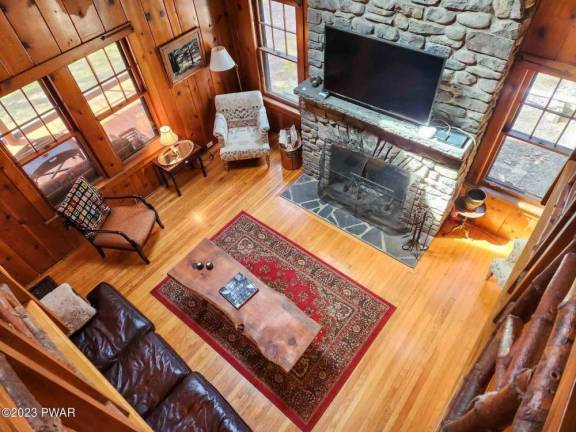 Classic log home features Old World charm and craftsmanship