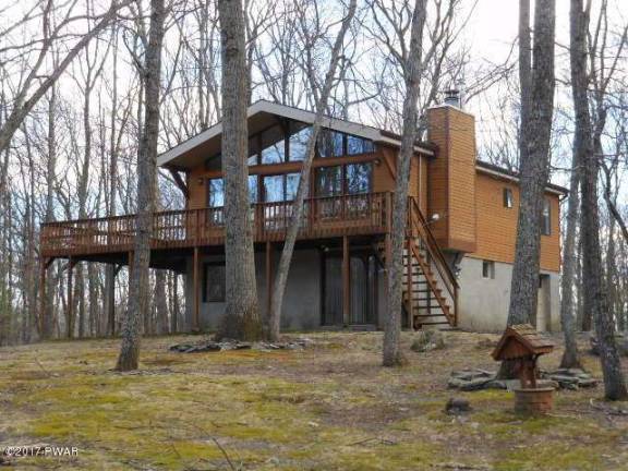 Updated country ranch with lake rights