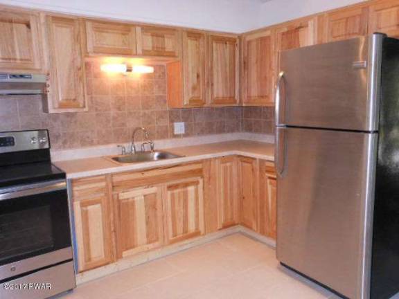 Remodeled ranch with rights to 120-acre lake