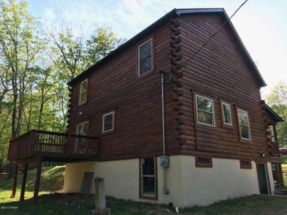 Brand new three-bedroom log and stone country cape
