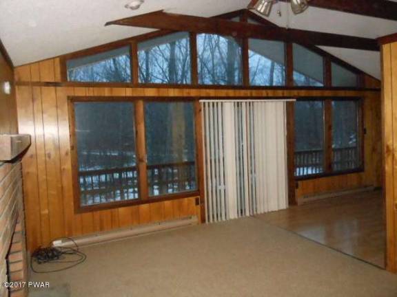 Updated country ranch with lake rights