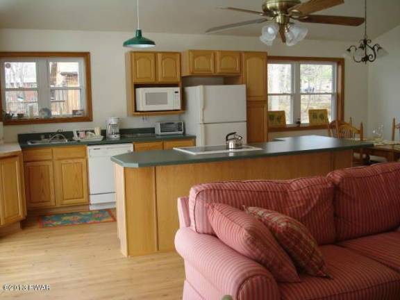 Enjoy the expansive view from this lakefront home