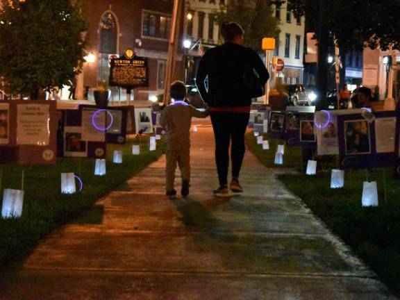 On International Overdose Awareness Day, the town square in Newton was the site of a candlelight vigil and public walk-through remembrance display of memories of lives lost to overdose. (Photo by Ryan T.)